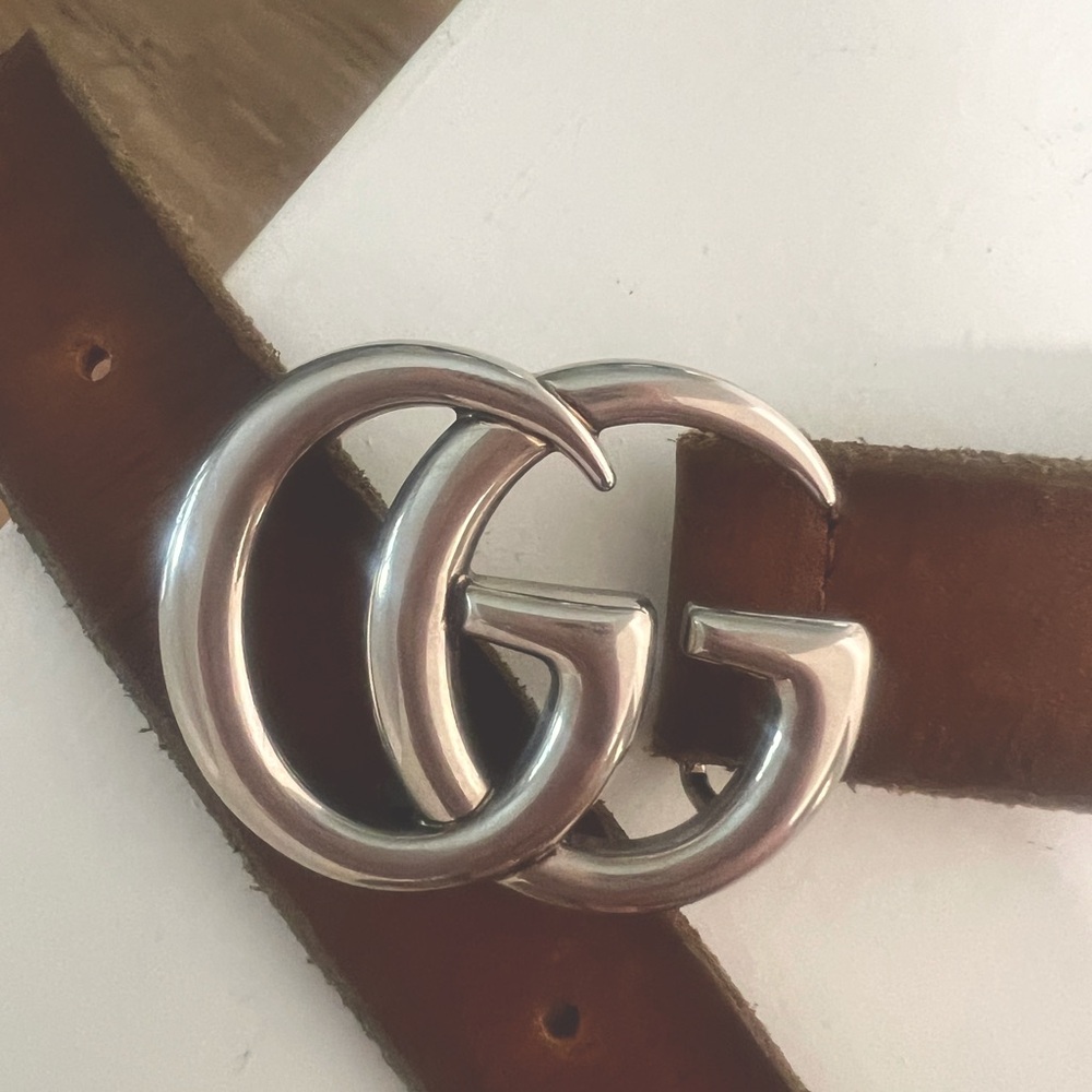 Cognac Gucci belt with silver buckle. Great condition, rarely worn